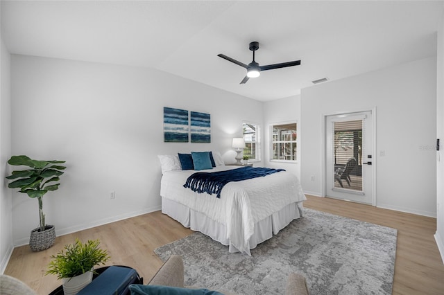 1760 W Shanelle Path, Lecanto, FL 34461 - bedroom featuring wood finished floors, access to outside, and ceiling fan