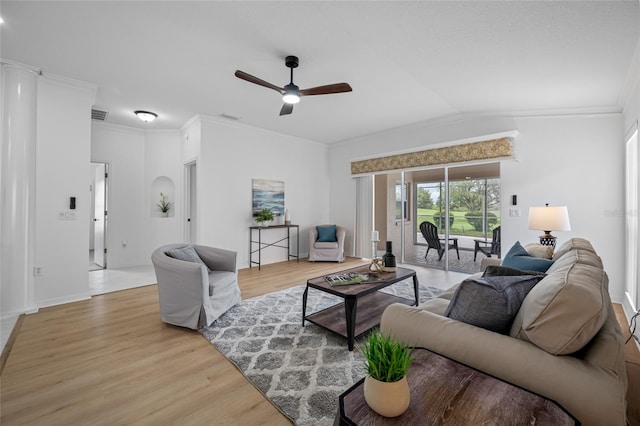 1760 W Shanelle Path, Lecanto, FL 34461 - living area featuring light wood-style flooring, crown molding, a ceiling fan, and vaulted ceiling