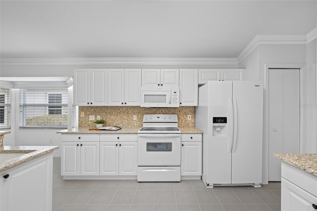 1760 W Shanelle Path, Lecanto, FL 34461 - kitchen featuring white appliances, light tile patterned floors, crown molding, and white cabinets
