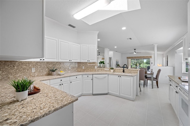 1760 W Shanelle Path, Lecanto, FL 34461 - kitchen featuring white appliances, a peninsula, ornamental molding, tasteful backsplash, and a ceiling fan