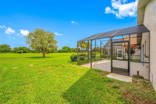 1760 W Shanelle Path, Lecanto, FL 34461 - view of grassy yard featuring a patio and a lanai