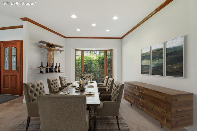 4128 Carrollwood Village Dr, Tampa, FL 33618 - dining room featuring ornamental molding and recessed lighting