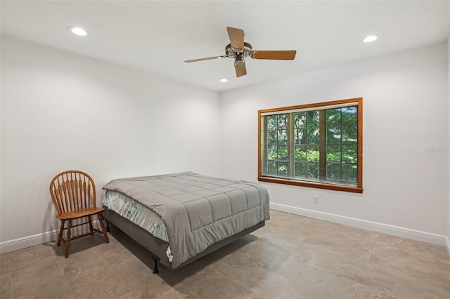 4128 Carrollwood Village Dr, Tampa, FL 33618 - bedroom with recessed lighting and ceiling fan