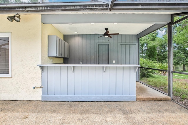 4128 Carrollwood Village Dr, Tampa, FL 33618 - exterior space featuring a ceiling fan and stucco siding