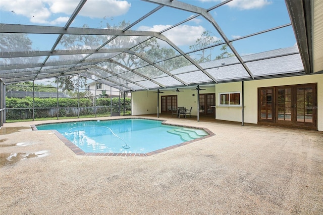 4128 Carrollwood Village Dr, Tampa, FL 33618 - view of swimming pool featuring french doors, a patio, ceiling fan, and glass enclosure