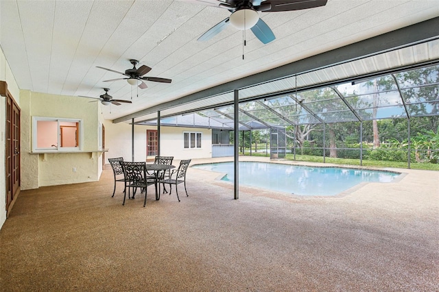 4128 Carrollwood Village Dr, Tampa, FL 33618 - outdoor pool with a ceiling fan, a patio area, and a lanai