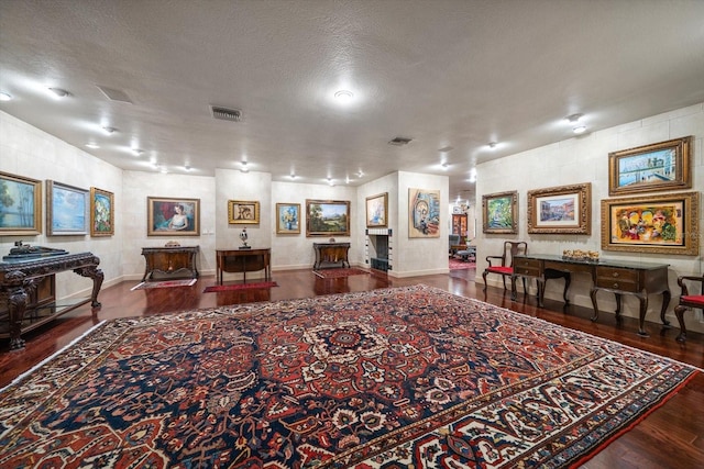 1835 Alicia Way, Clearwater, FL 33764 - living area with wood finished floors and a textured ceiling