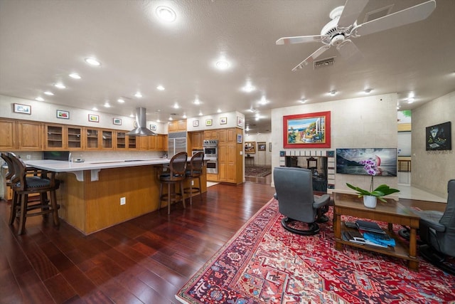 1835 Alicia Way, Clearwater, FL 33764 - living area featuring dark wood-style floors, ceiling fan, and recessed lighting