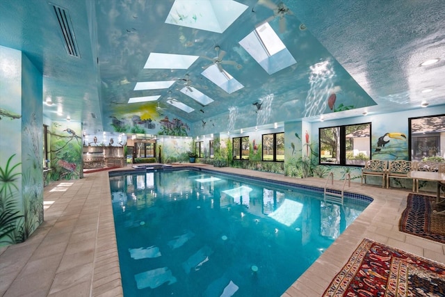 1835 Alicia Way, Clearwater, FL 33764 - indoor pool featuring a skylight