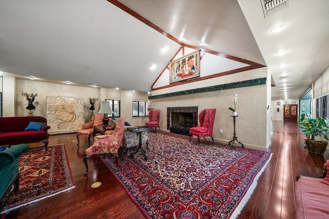 1835 Alicia Way, Clearwater, FL 33764 - living area with wood finished floors, a fireplace, and vaulted ceiling