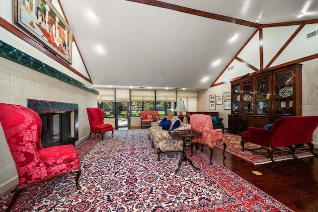1835 Alicia Way, Clearwater, FL 33764 - living room with a fireplace, wood finished floors, and high vaulted ceiling