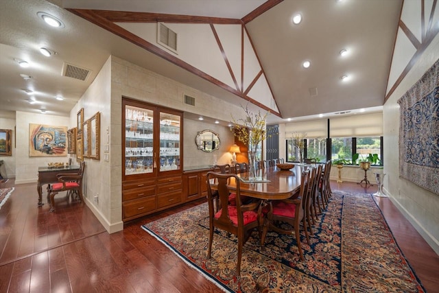 1835 Alicia Way, Clearwater, FL 33764 - dining space featuring dark wood finished floors, high vaulted ceiling, and recessed lighting