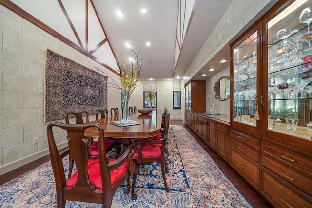 1835 Alicia Way, Clearwater, FL 33764 - dining space with vaulted ceiling, dark wood finished floors, and recessed lighting