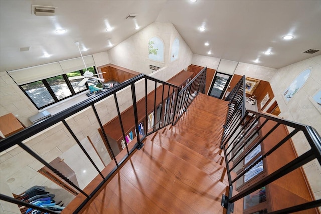 1835 Alicia Way, Clearwater, FL 33764 - staircase with plenty of natural light, recessed lighting, and high vaulted ceiling