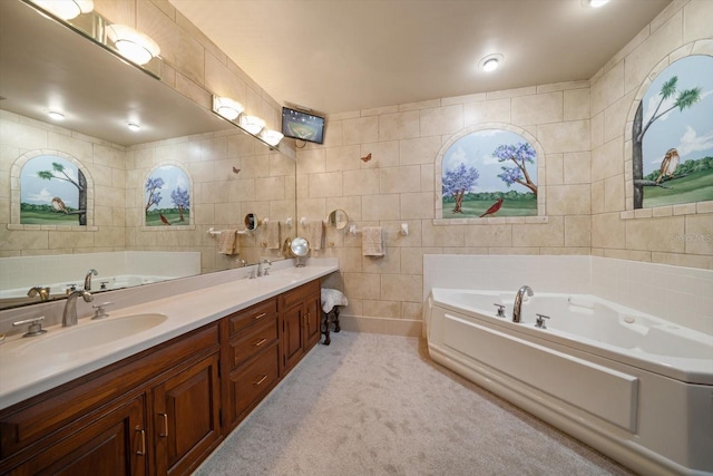 1835 Alicia Way, Clearwater, FL 33764 - full bathroom featuring tile walls, a bath, and double vanity