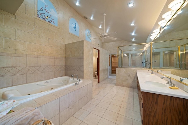 1835 Alicia Way, Clearwater, FL 33764 - full bathroom with tile patterned floors, a whirlpool tub, a shower stall, double vanity, and a ceiling fan