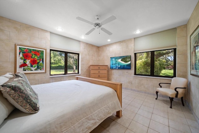 1835 Alicia Way, Clearwater, FL 33764 - bedroom with tile walls, light tile patterned flooring, recessed lighting, and ceiling fan