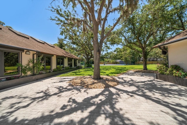 1835 Alicia Way, Clearwater, FL 33764 - view of patio featuring a water view