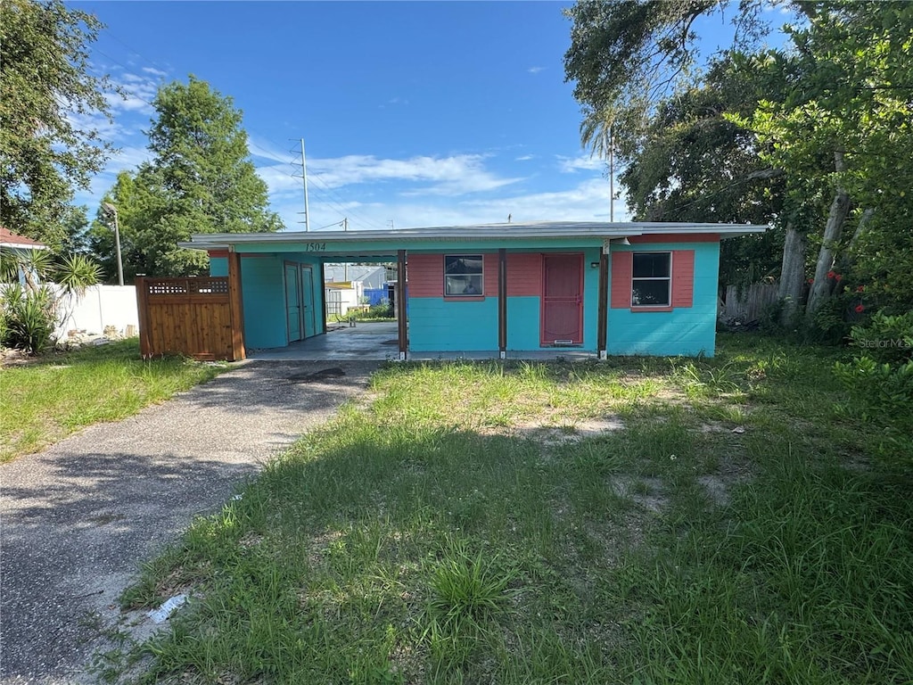 1504 Stevensons Dr, Clearwater, FL 33755 - view of front of house featuring driveway and an attached carport