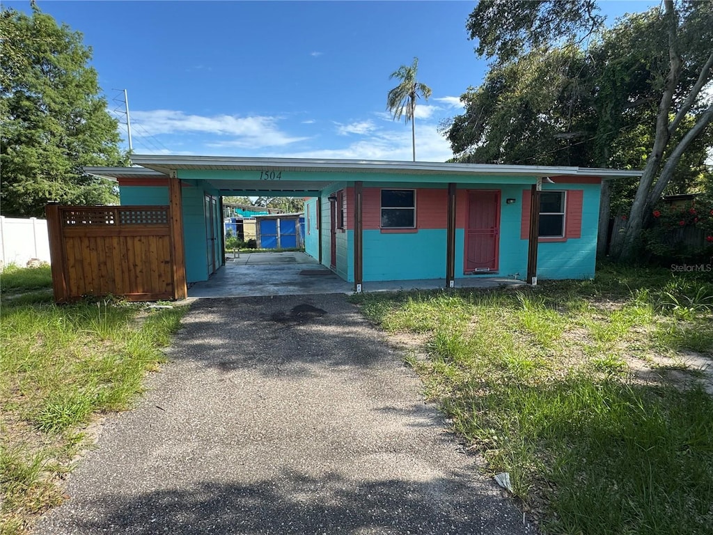 1504 Stevensons Dr, Clearwater, FL 33755 - view of front of property with driveway and a carport