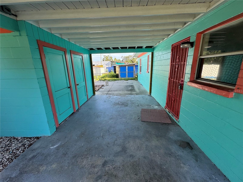 1504 Stevensons Dr, Clearwater, FL 33755 - view of patio featuring a carport