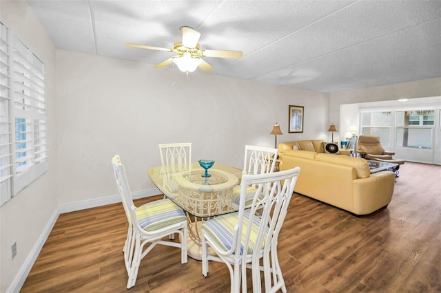 920 Virginia St Unit 204, Dunedin, FL 34698 - dining area with wood finished floors, ceiling fan, and a textured ceiling