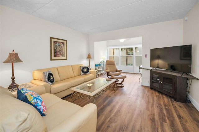 920 Virginia St Unit 204, Dunedin, FL 34698 - living room with wood finished floors and baseboards