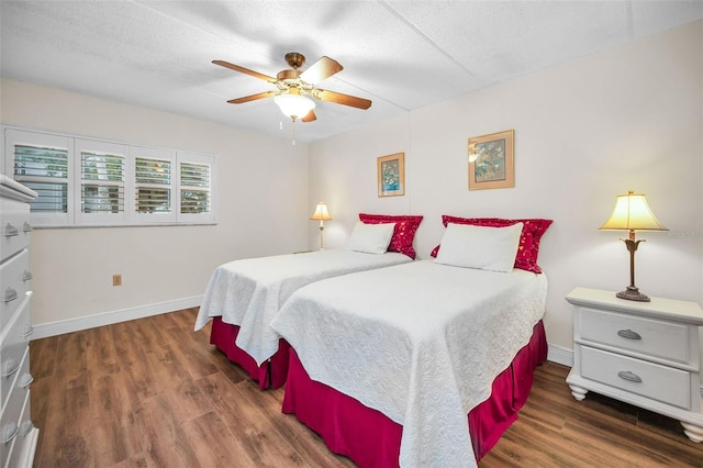 920 Virginia St Unit 204, Dunedin, FL 34698 - bedroom with wood finished floors, ceiling fan, and a textured ceiling