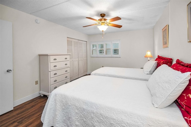 920 Virginia St Unit 204, Dunedin, FL 34698 - bedroom with wood finished floors, a closet, and ceiling fan