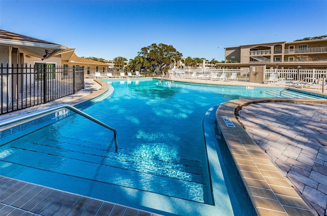920 Virginia St Unit 204, Dunedin, FL 34698 - community pool with a patio
