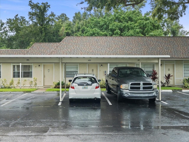 2357 Walton Cir Unit M6, Palm Harbor, FL 34683 - view of partially covered parking lot