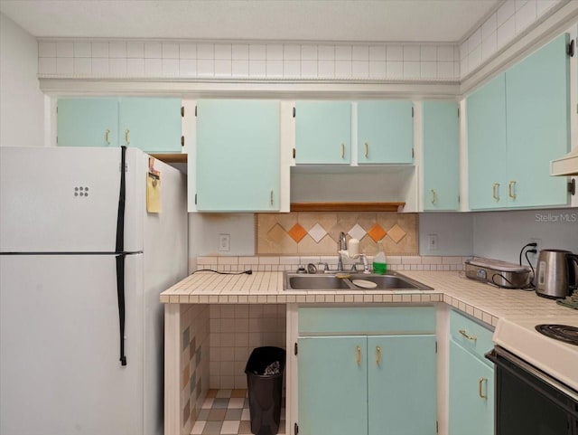 2357 Walton Cir Unit M6, Palm Harbor, FL 34683 - kitchen with white appliances, light countertops, tasteful backsplash, and open shelves
