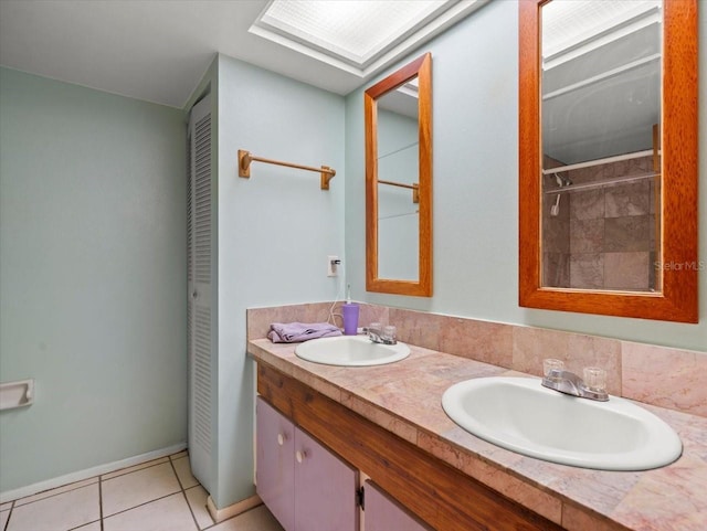 2357 Walton Cir Unit M6, Palm Harbor, FL 34683 - bathroom with a closet, double vanity, and tile patterned flooring