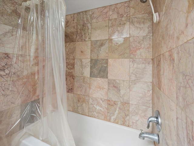 2357 Walton Cir Unit M6, Palm Harbor, FL 34683 - bathroom view of shower / bath combination with curtain