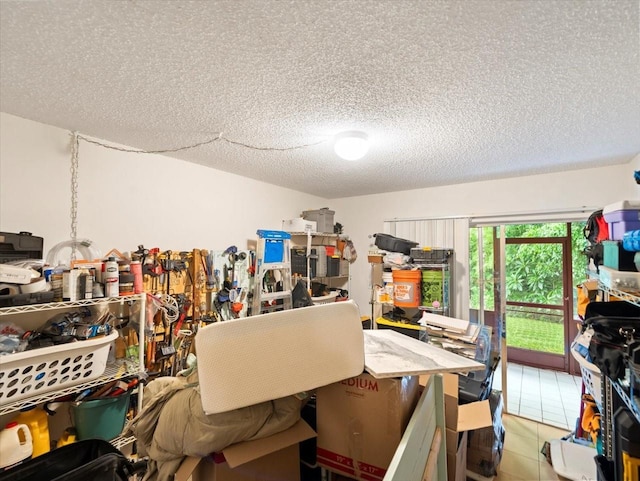 2357 Walton Cir Unit M6, Palm Harbor, FL 34683 - miscellaneous room with a textured ceiling and light tile patterned flooring