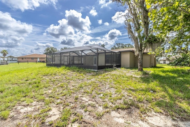 271 Eastpoint Ct, Spring Hill, FL 34606 - view of green lawn featuring glass enclosure