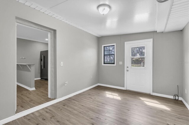 271 Eastpoint Ct, Spring Hill, FL 34606 - entryway featuring wood finished floors and baseboards