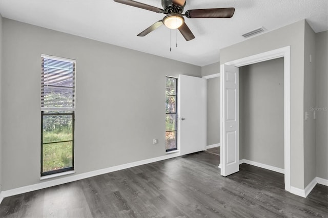 271 Eastpoint Ct, Spring Hill, FL 34606 - unfurnished bedroom with dark wood-type flooring and a ceiling fan