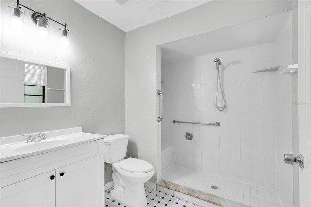 271 Eastpoint Ct, Spring Hill, FL 34606 - bathroom featuring vanity, a tile shower, and a textured wall