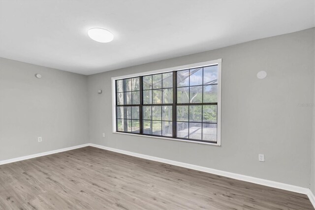 271 Eastpoint Ct, Spring Hill, FL 34606 - spare room featuring wood finished floors