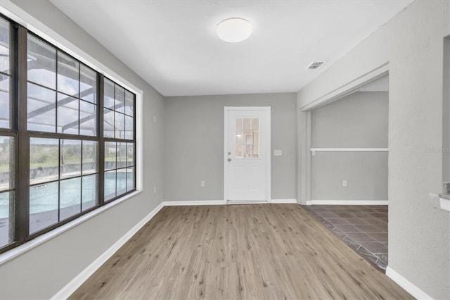 271 Eastpoint Ct, Spring Hill, FL 34606 - entrance foyer featuring wood finished floors and baseboards