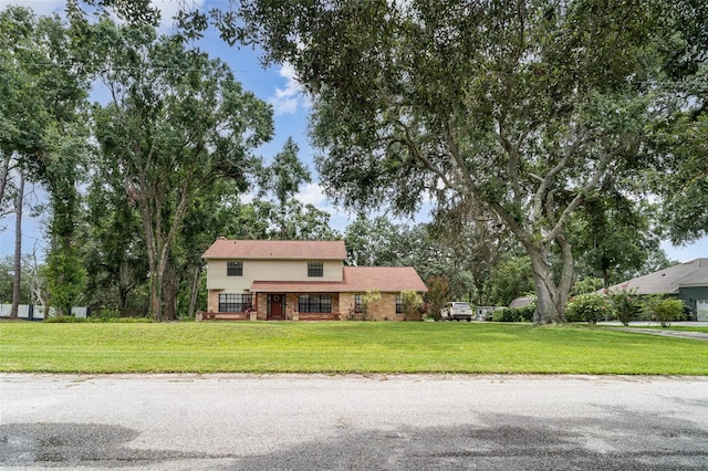 11414 Donneymoor Dr, Riverview, FL 33569 - view of front facade featuring a front yard and brick siding