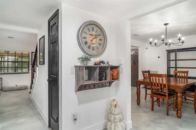 11414 Donneymoor Dr, Riverview, FL 33569 - dining area with concrete floors, a chandelier, and stairway