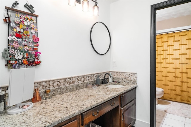 11414 Donneymoor Dr, Riverview, FL 33569 - bathroom with vanity, backsplash, a shower with shower curtain, and tile patterned floors