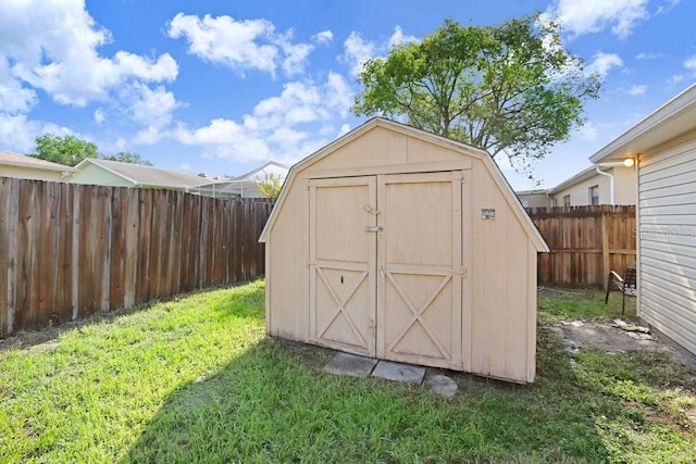 7841 Royal Stewart Dr, New Port Richey, FL 34653 - view of shed with a fenced backyard