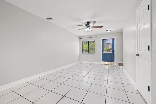 1724 Adams Cir S, Largo, FL 33771 - unfurnished room featuring ceiling fan and light tile patterned floors