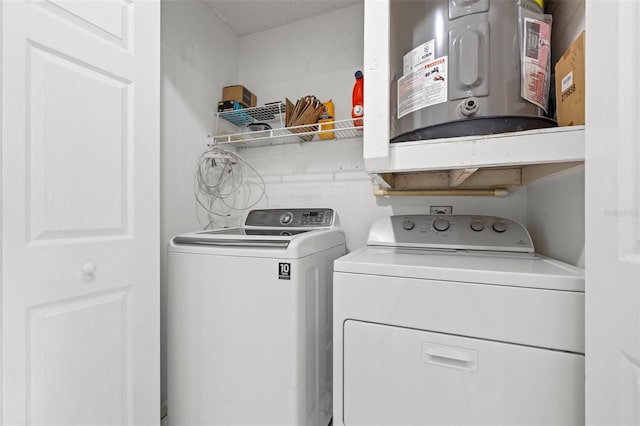 1724 Adams Cir S, Largo, FL 33771 - laundry room with washer and clothes dryer and water heater