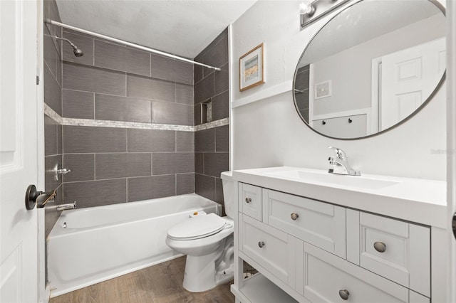 1724 Adams Cir S, Largo, FL 33771 - bathroom with vanity, bathing tub / shower combination, and wood finished floors