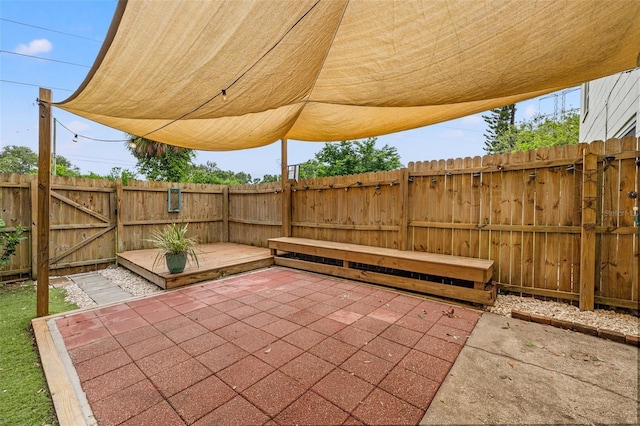 1724 Adams Cir S, Largo, FL 33771 - fenced backyard with a patio and a gate