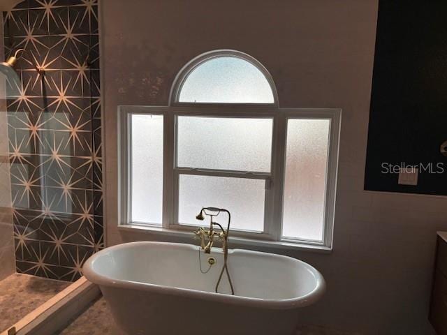 1601 14th St N, Saint Petersburg, FL 33704 - bathroom featuring a freestanding tub